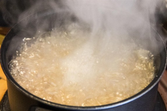 Boiling the quinoa