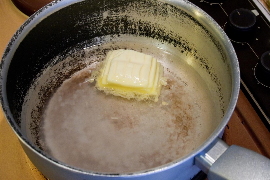 Melting the butter, sugar and water